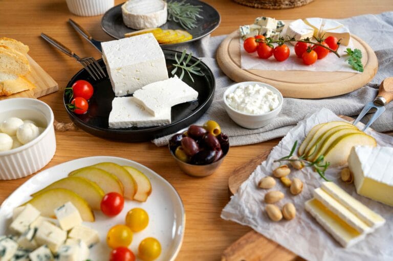 A variety of cottage cheese dishes displayed on a table.