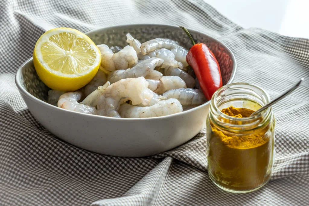 Fresh shrimp with marinade ingredients.