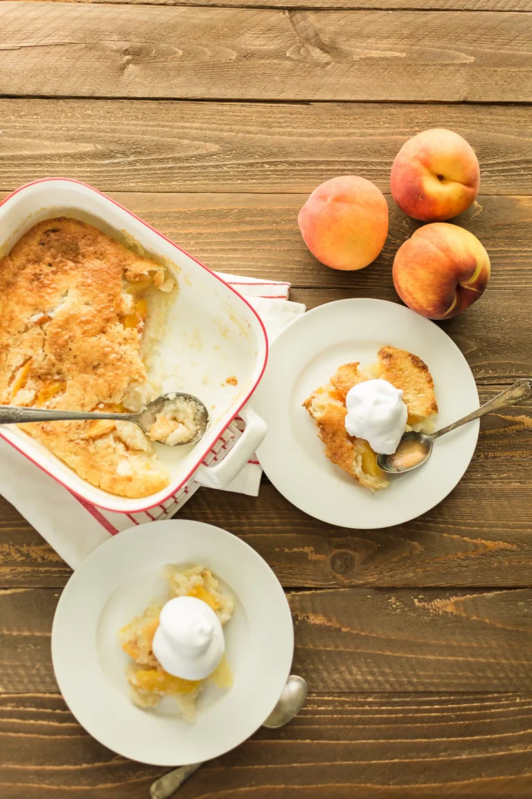 Peach cobbler with cake mix served in a baking dish