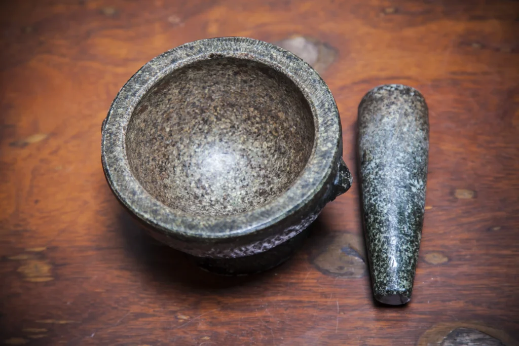 An artisan-crafted molcajete made from volcanic stone.