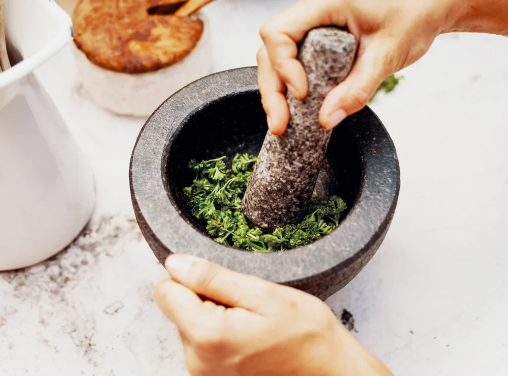 Molcajete grinding spices and herbs